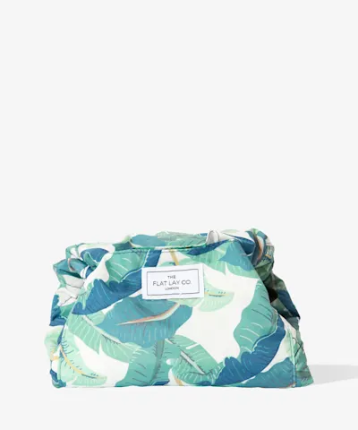 The Flat Lay Co. - Drawstring Makeup Bag in Tropical Leaves